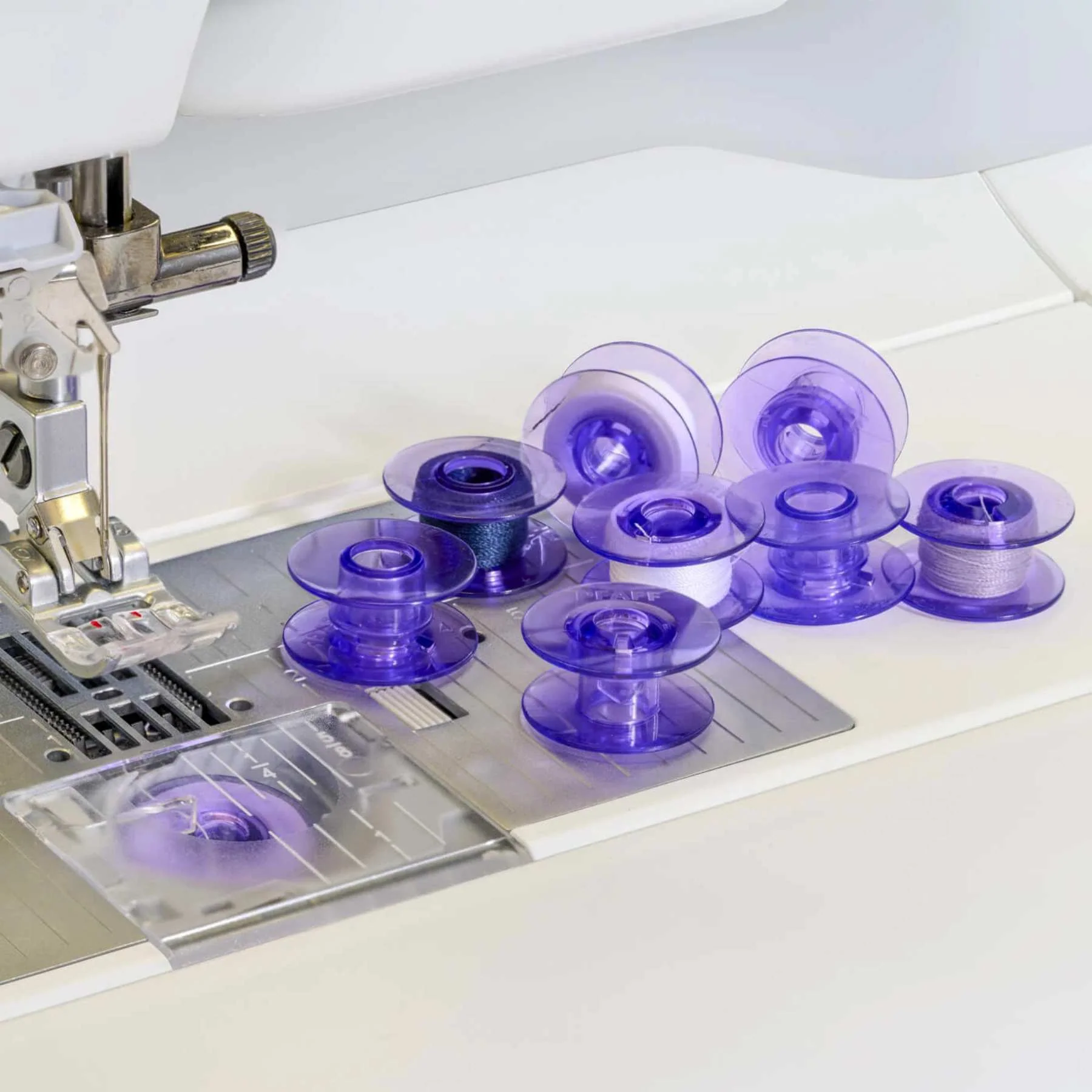 PFAFF® Bobbin Winder with Violet Bobbins Bundle - Image 3