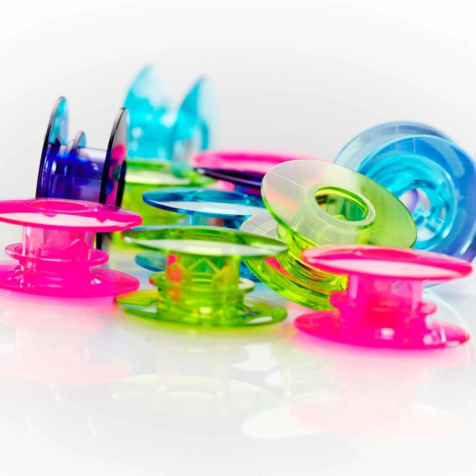PFAFF® Bobbin Winder with Watercolor Bobbins Bundle - Image 3